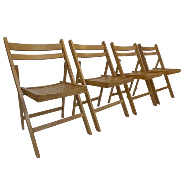 Ensemble de quatre chaises pliantes en bois vintage design design années 60