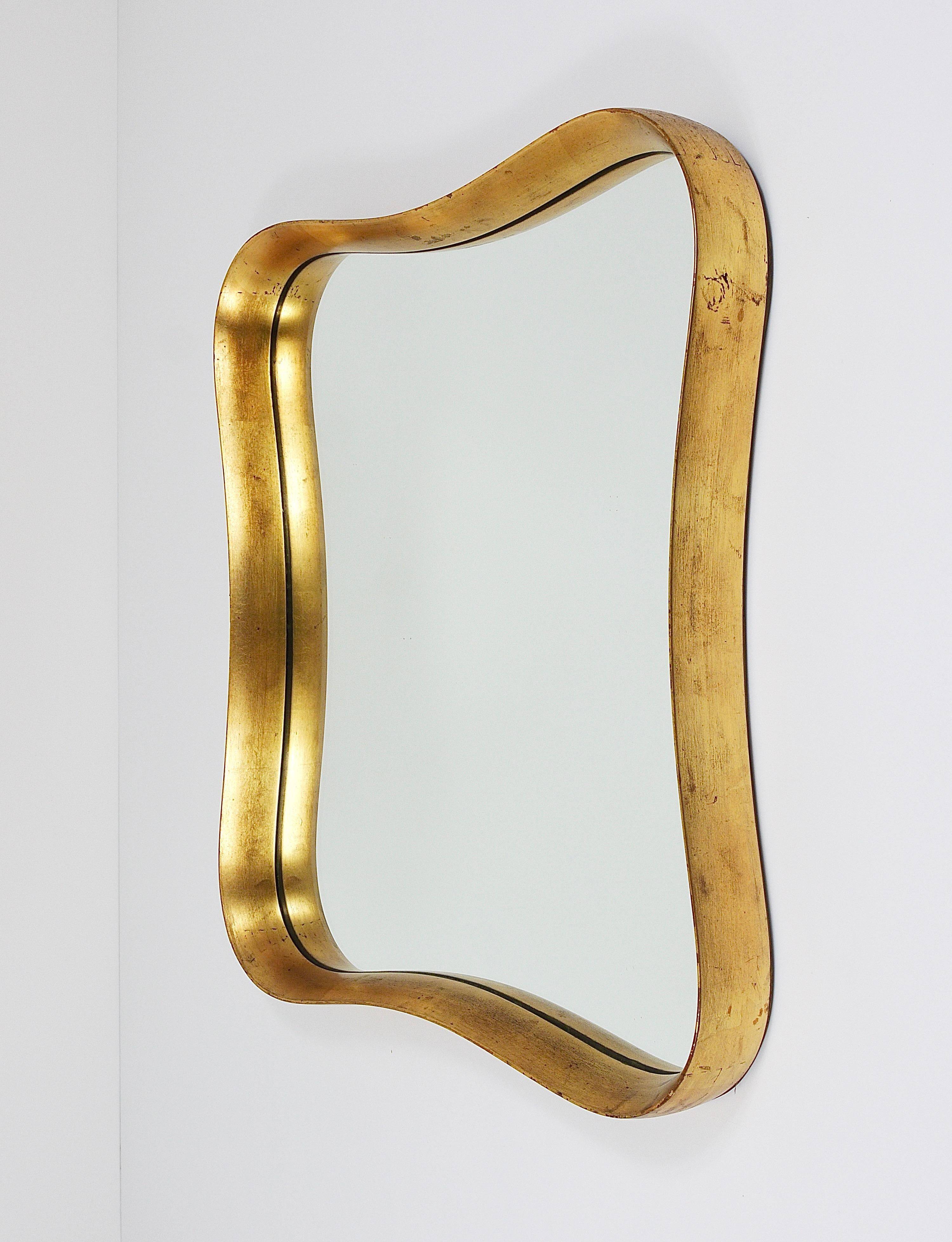 Golden wooden mirror in the style of Gio Ponti by Max Welz, Vienna, Austria, 1940s.