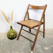 Folding chair with a cane seat