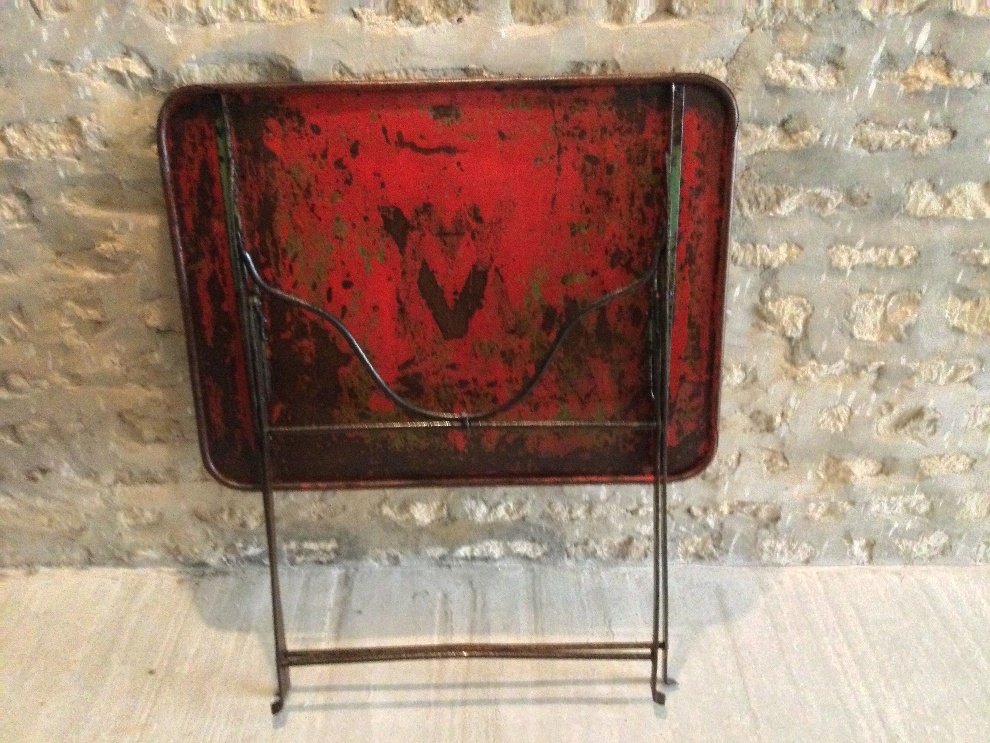Folding riveted iron table
