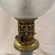 Oil lamp in celadon and bronze with its original glass globe, 19th century.