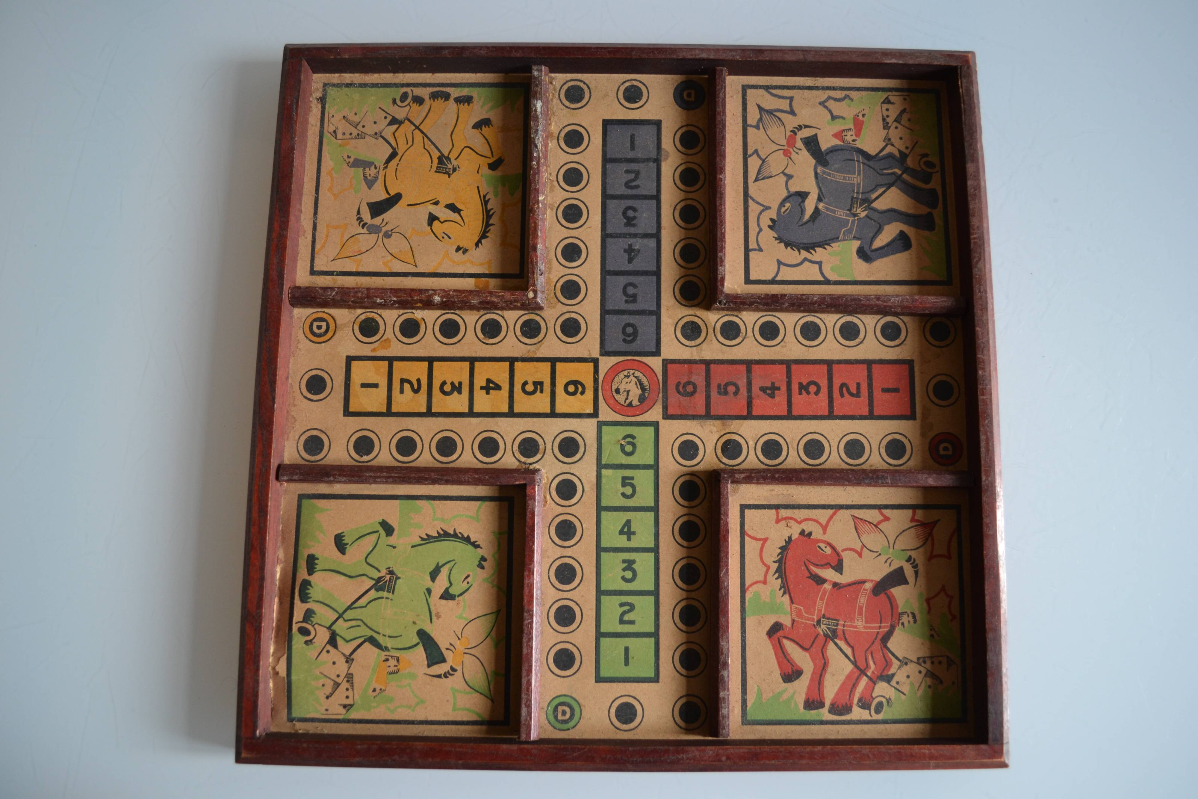 Old game board of small horses