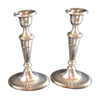 Pair of silver metal candlesticks