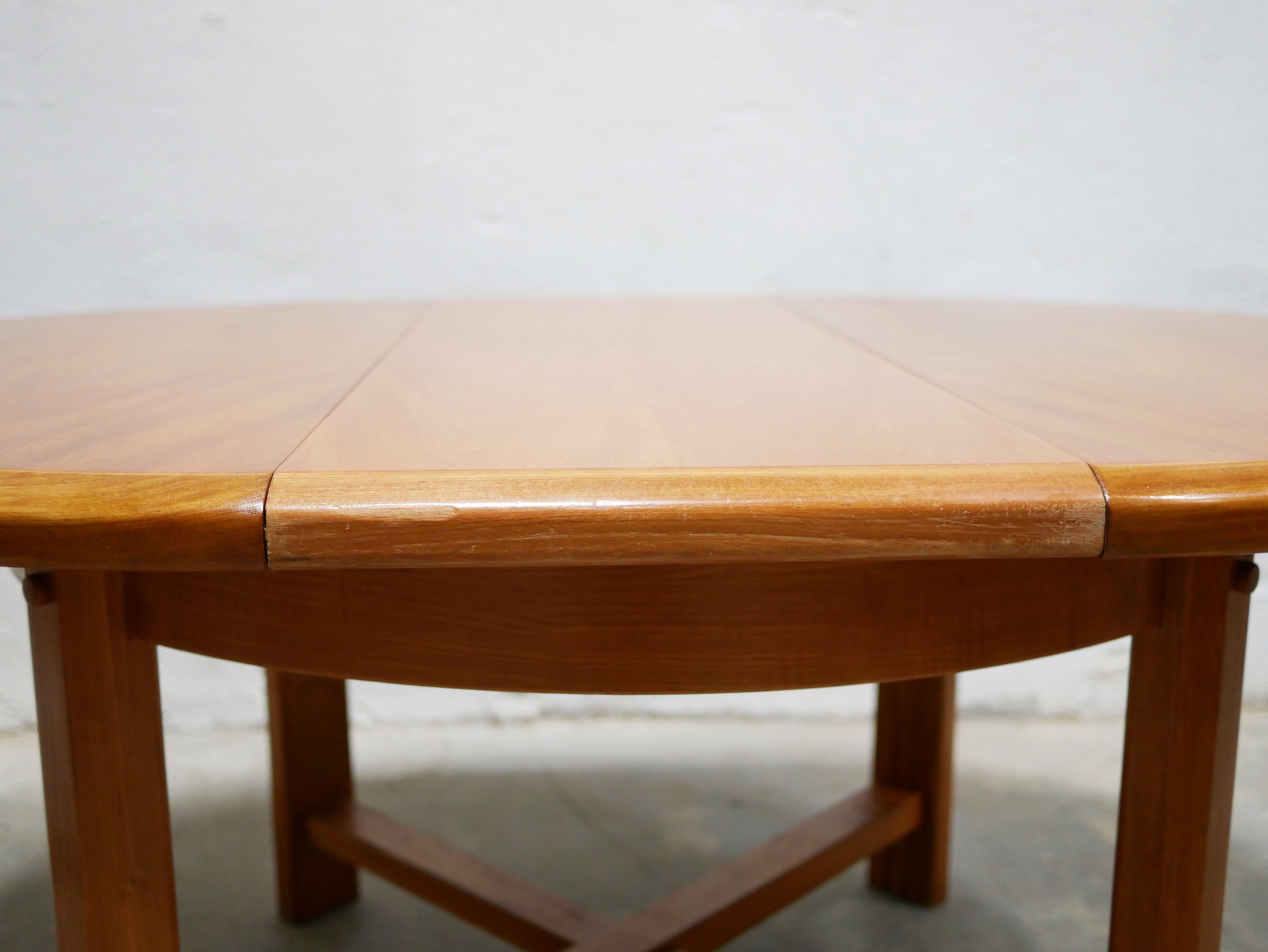 Vintage extendable round wooden dining table