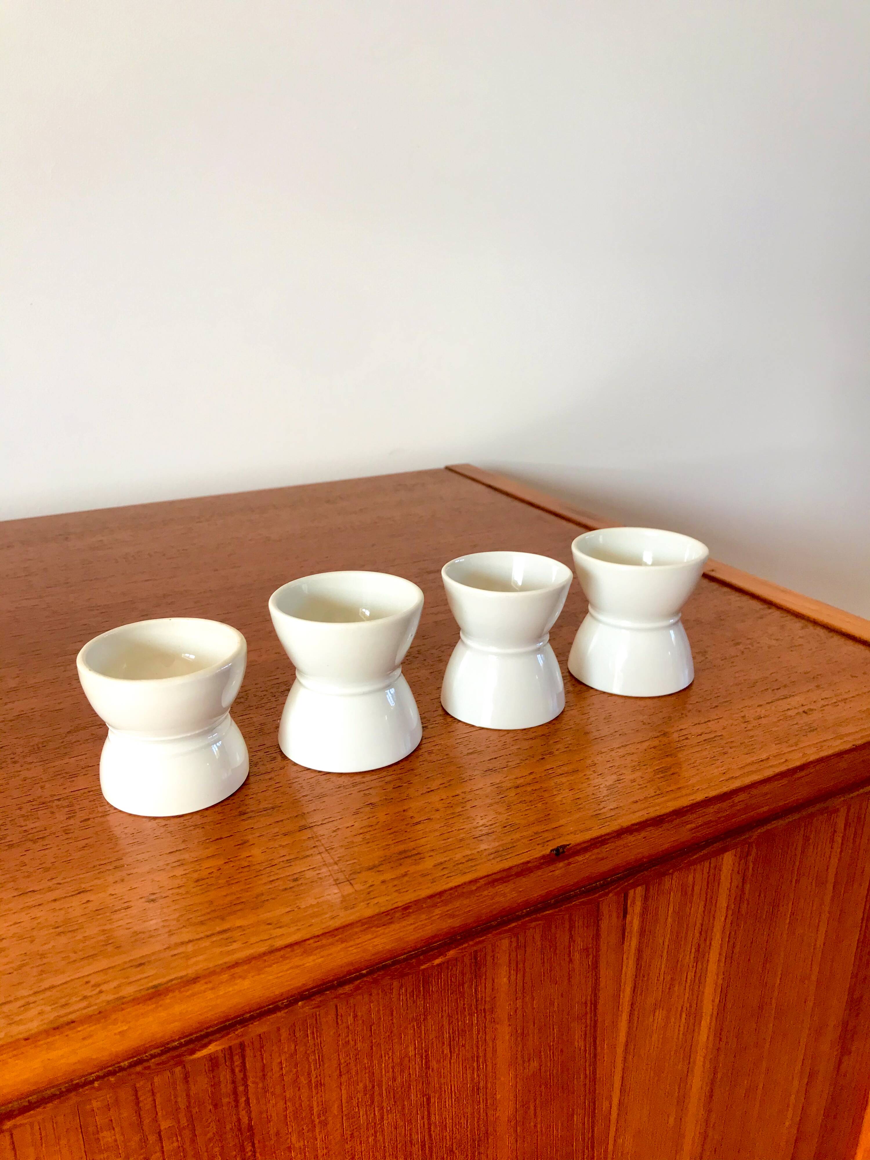 set of 4 earthenware diabolo egg cups early 20th century