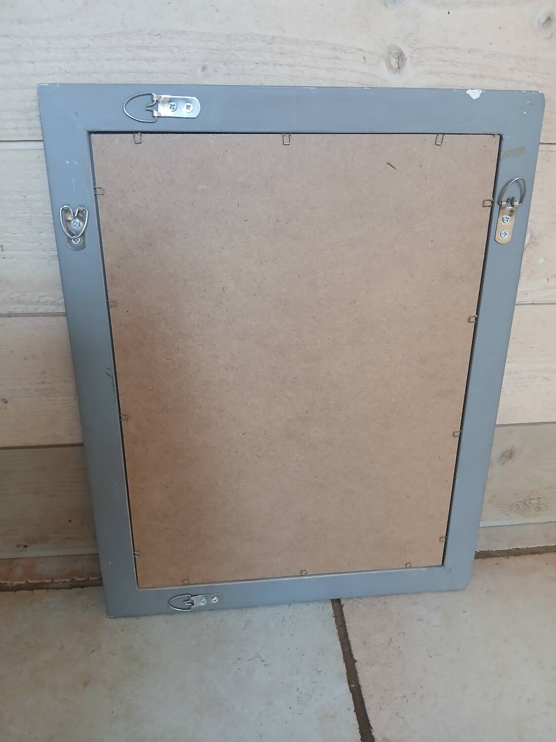 Mirror with a grey wooden frame