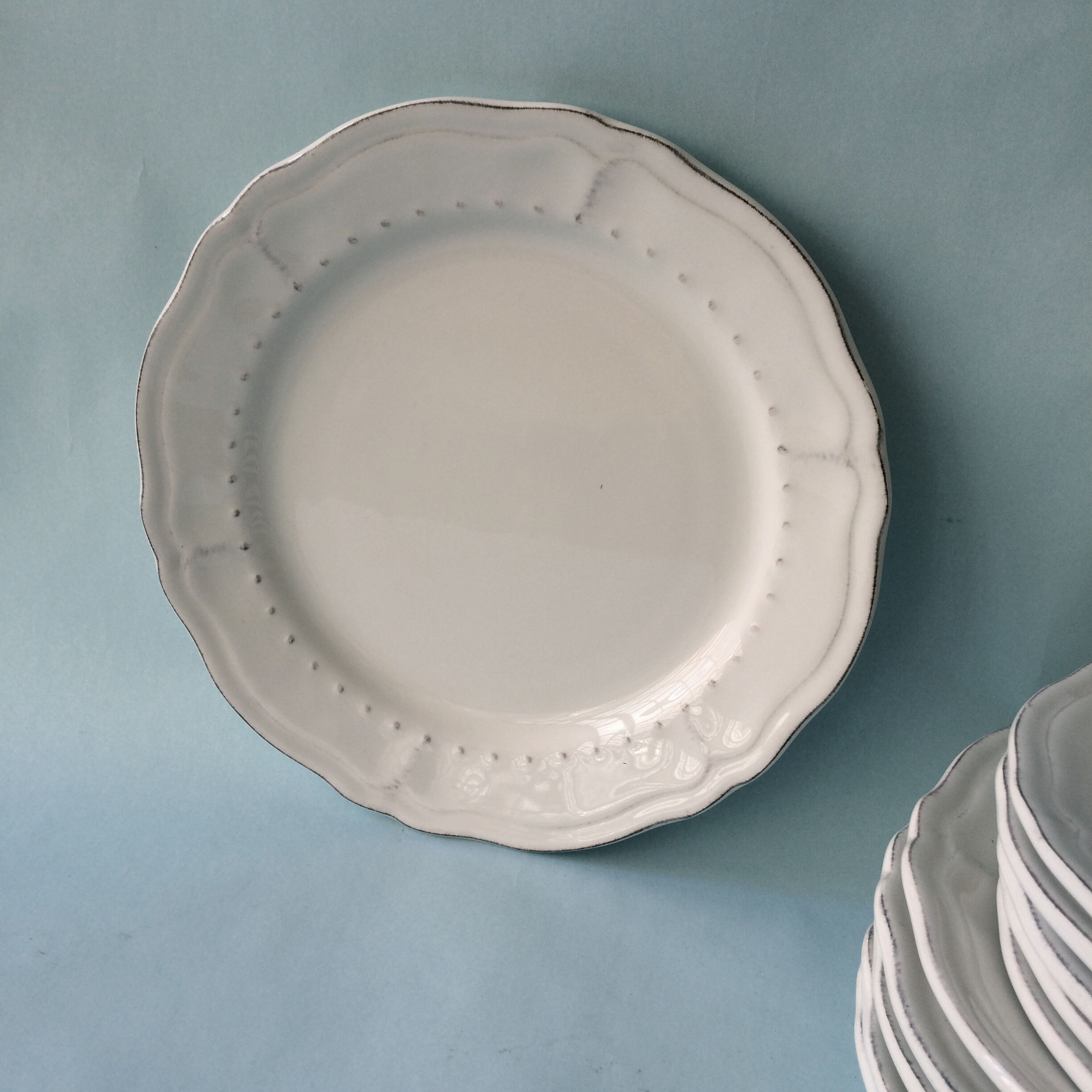 White plates in glazed red earth