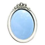 Oval mirror with golden knot