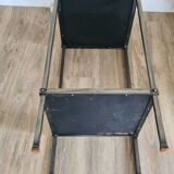 Pedestal table in leather and metal