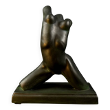 Modern sculpture of a nude woman in green ceramic, signed Carlos Nazareth