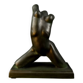 Modern sculpture of a nude woman in green ceramic, signed Carlos Nazareth