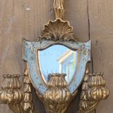 Pair of carved wood sconces