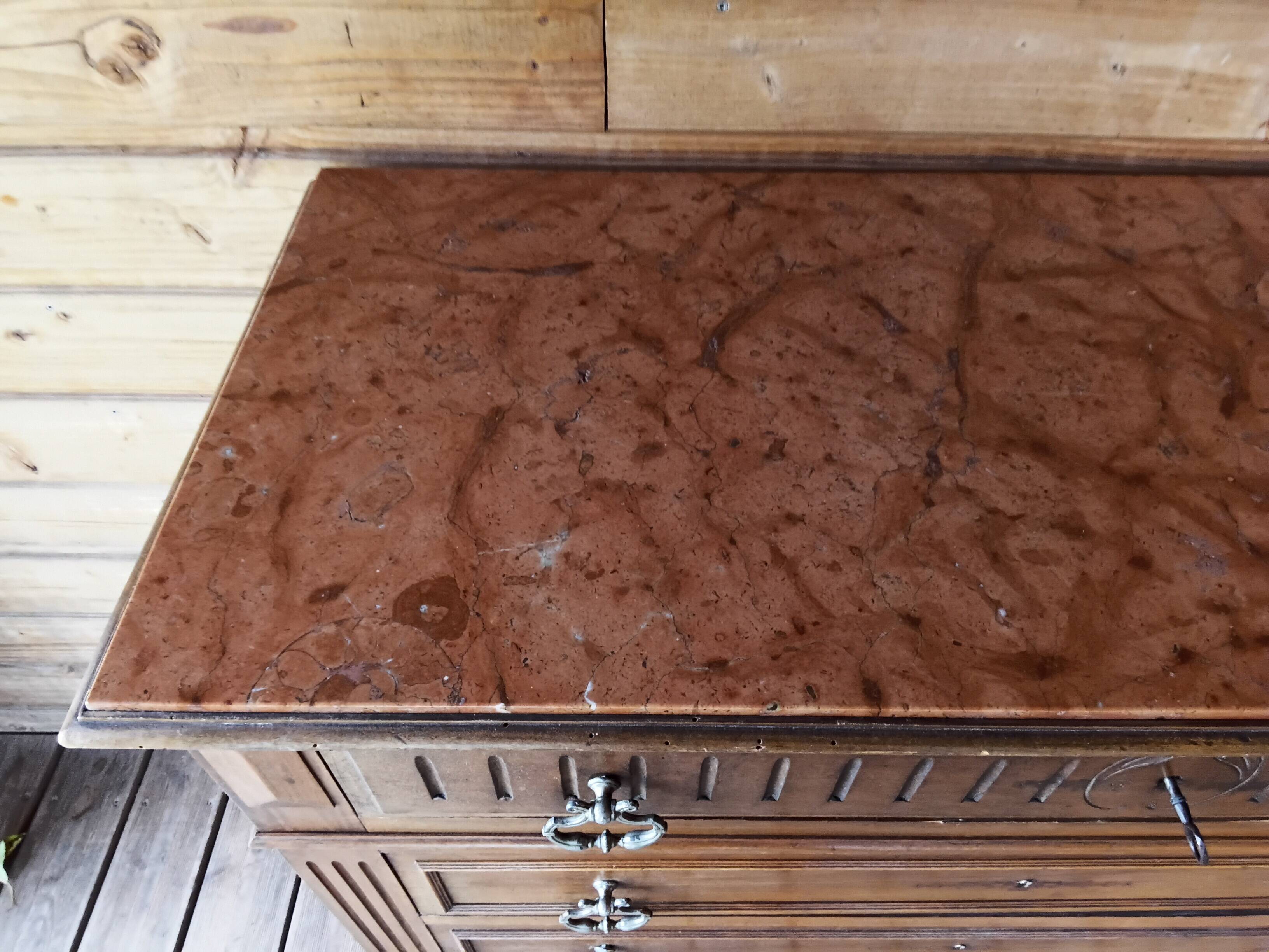 Antique chest of drawers with marble top
