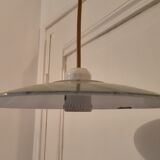 Old suspension in green enamelled sheet metal and porcelain socket to hang