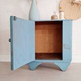 Old blue wood bedside table