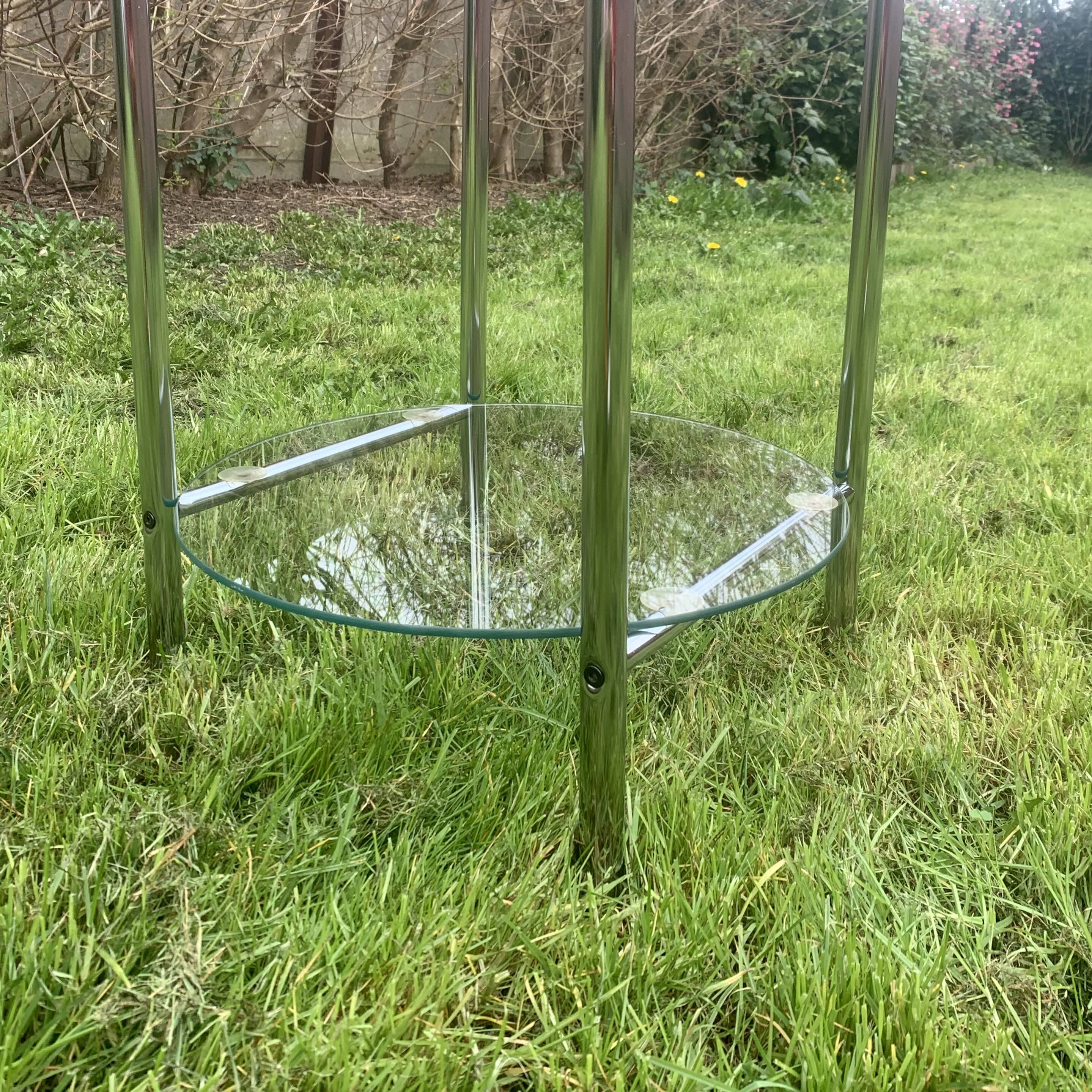 Pedestal table, vintage chrome steel saddle with 2 round windows