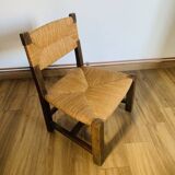 Pair of low wooden and straw armchairs