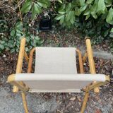 Rattan armchair and foldable canvas