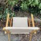 Rattan armchair and foldable canvas