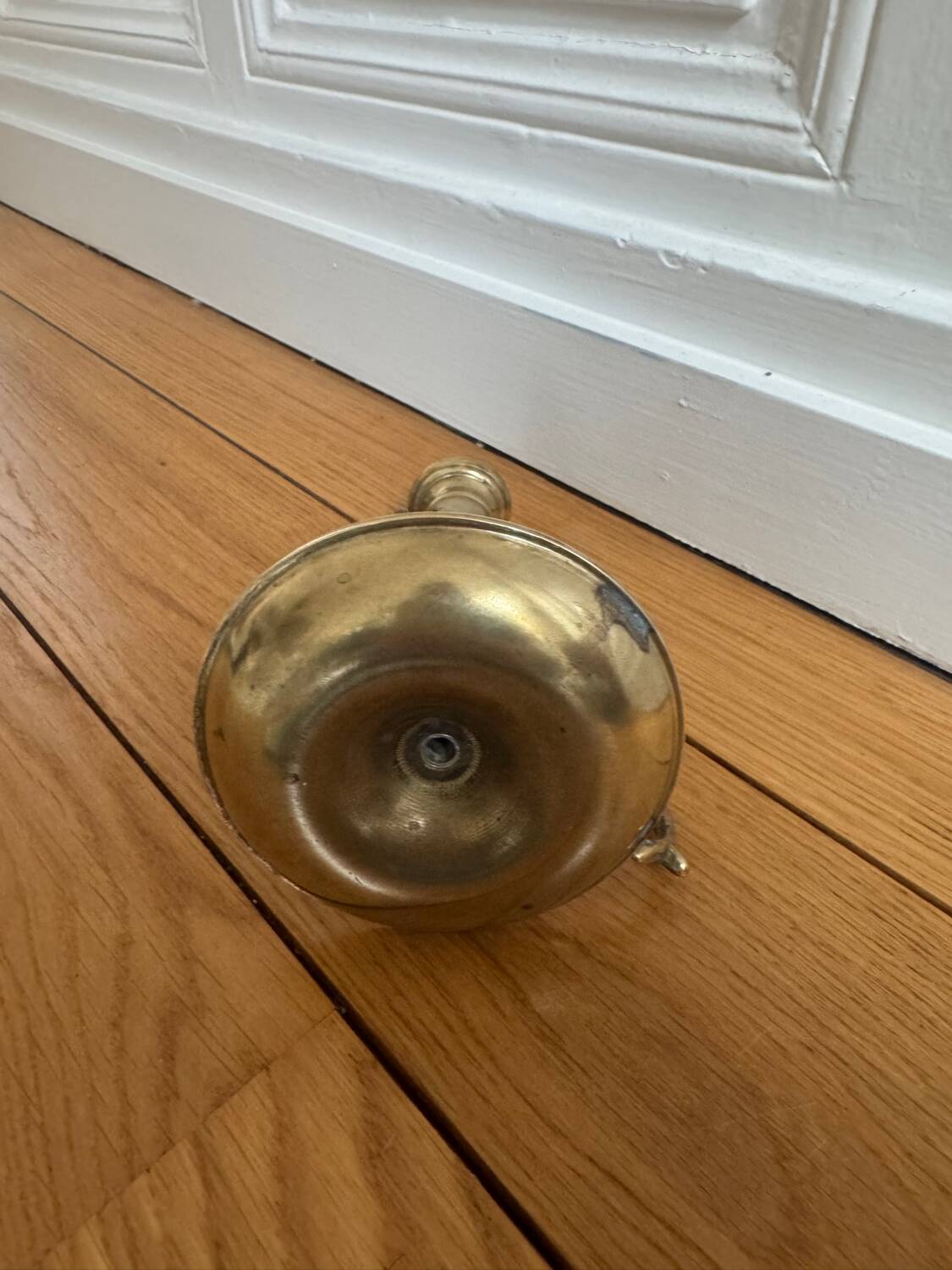 Pink glass and brass candlestick