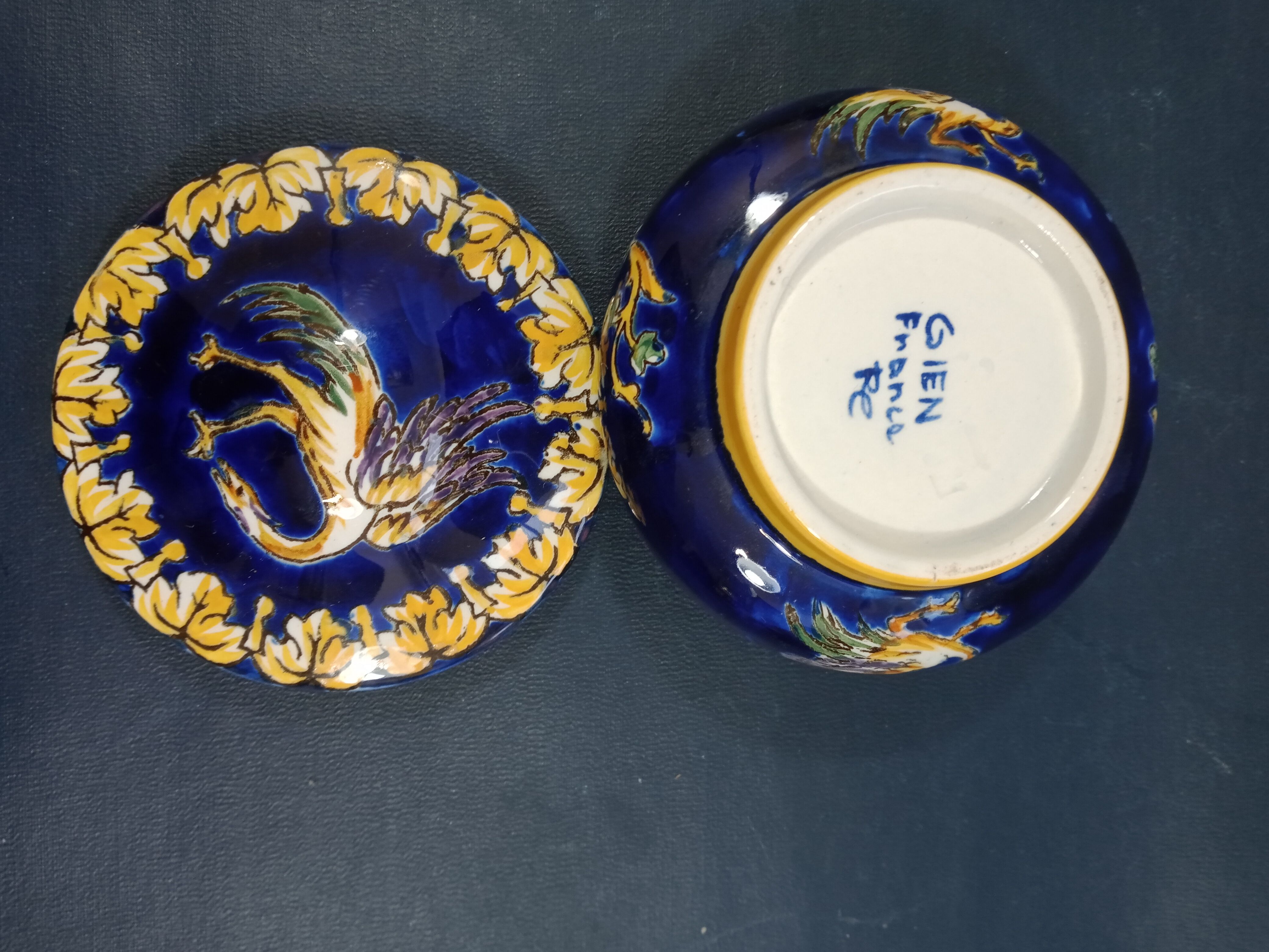 Empty Gien earthenware pocket decorated with chimera decoration