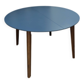 Table ronde extensible en noyer et peinte en bleu