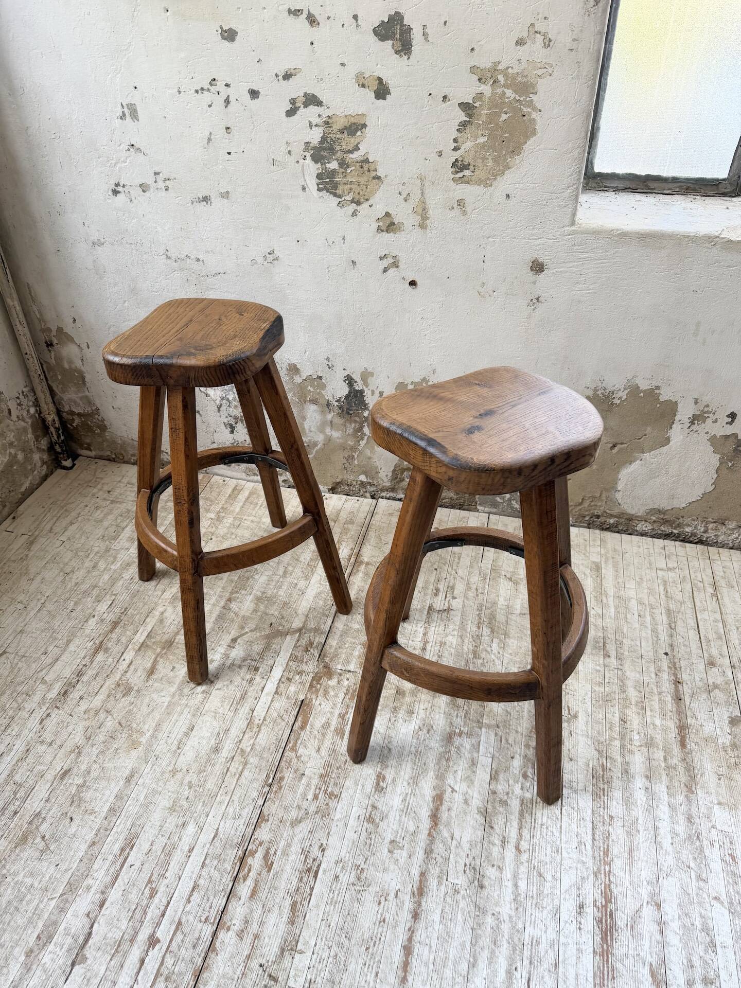 Pair of Henri Bataille stools in oak