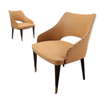 Pair of vintage armchairs from the 50s-60s in ebony wood, brass, with padded seats.