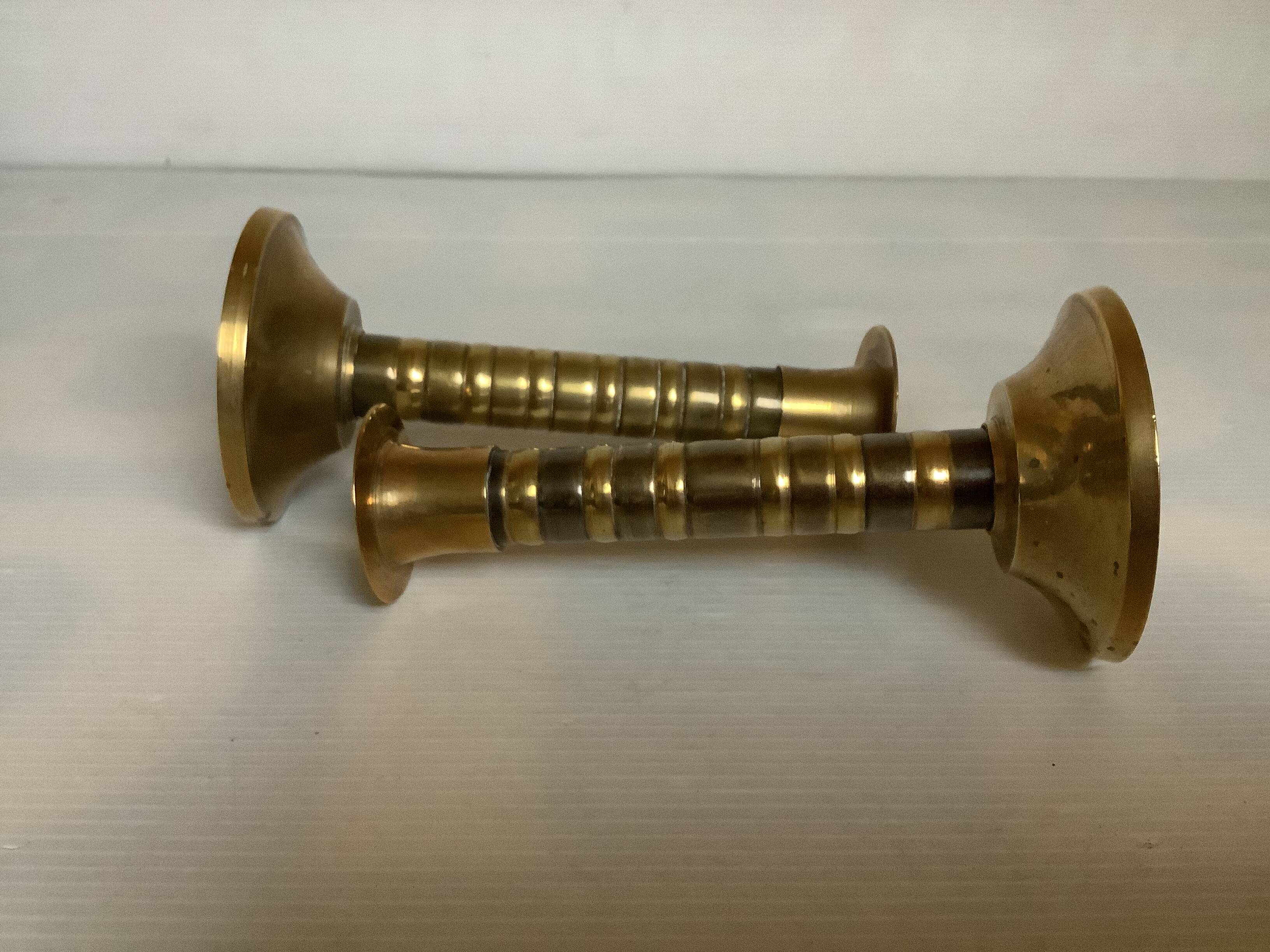 Pair of small two-tone brass candlesticks