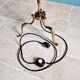 Brass floor lamp with rattan shade, 1950s-60s.