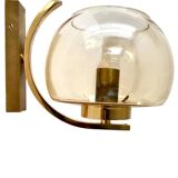 Brass and smoked glass arc wall lights. 1970
