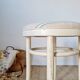 Vintage curved wooden stool in Baumann style, striped seat.