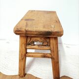Small rustic old wooden stool