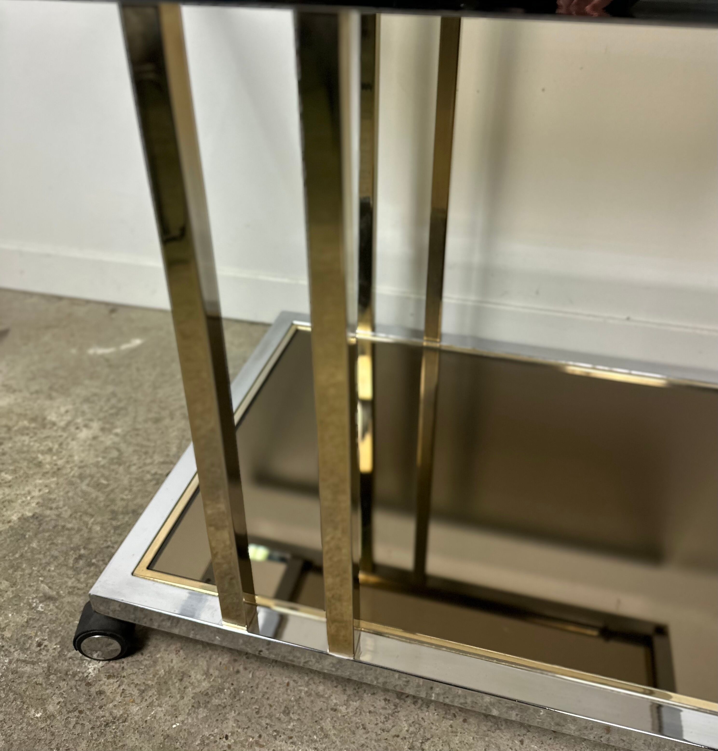 Belgo chrome serving cart/rolling table in chromed and gold-plated brass, 70s