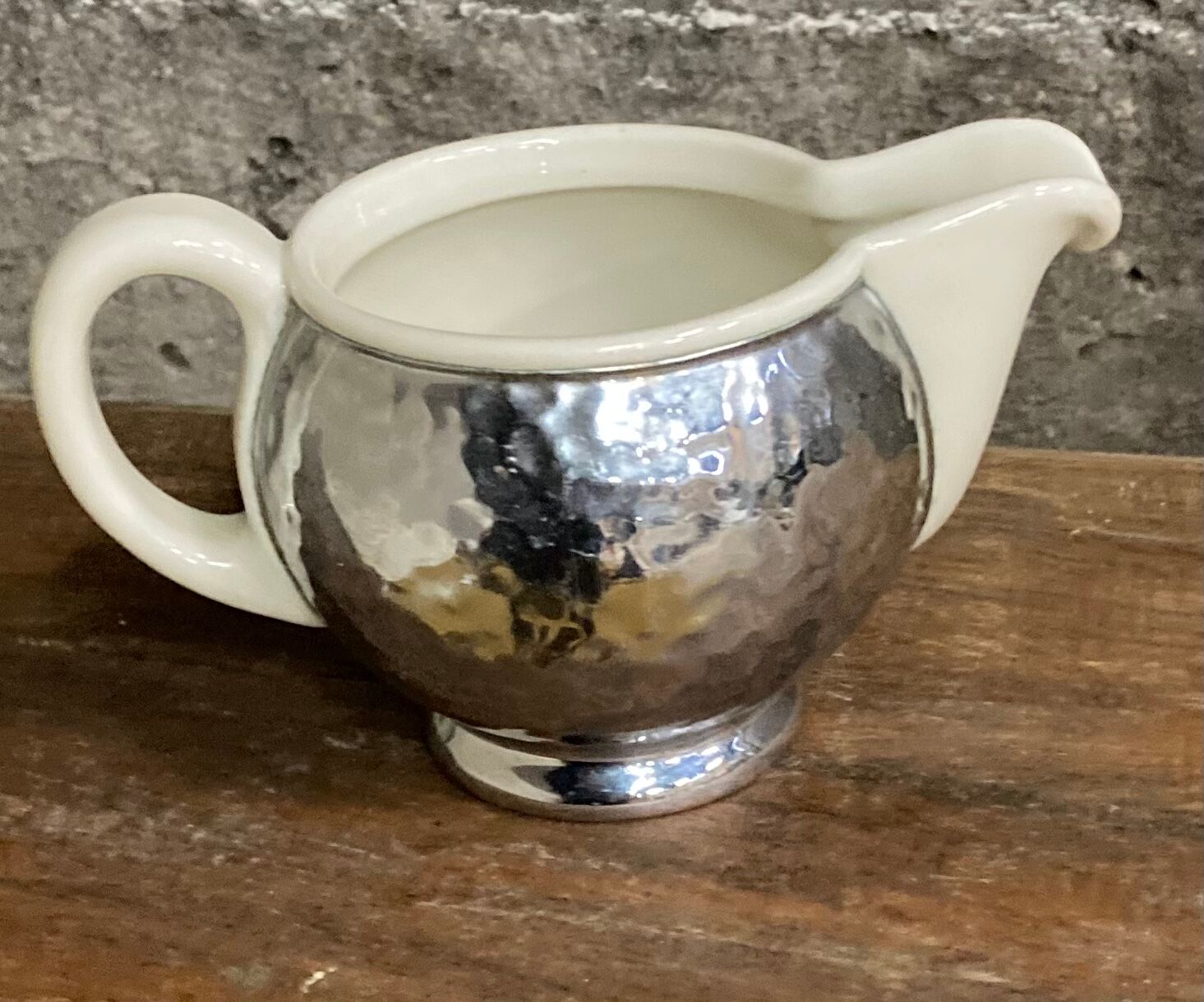 Ceramic/tinned milk jug.