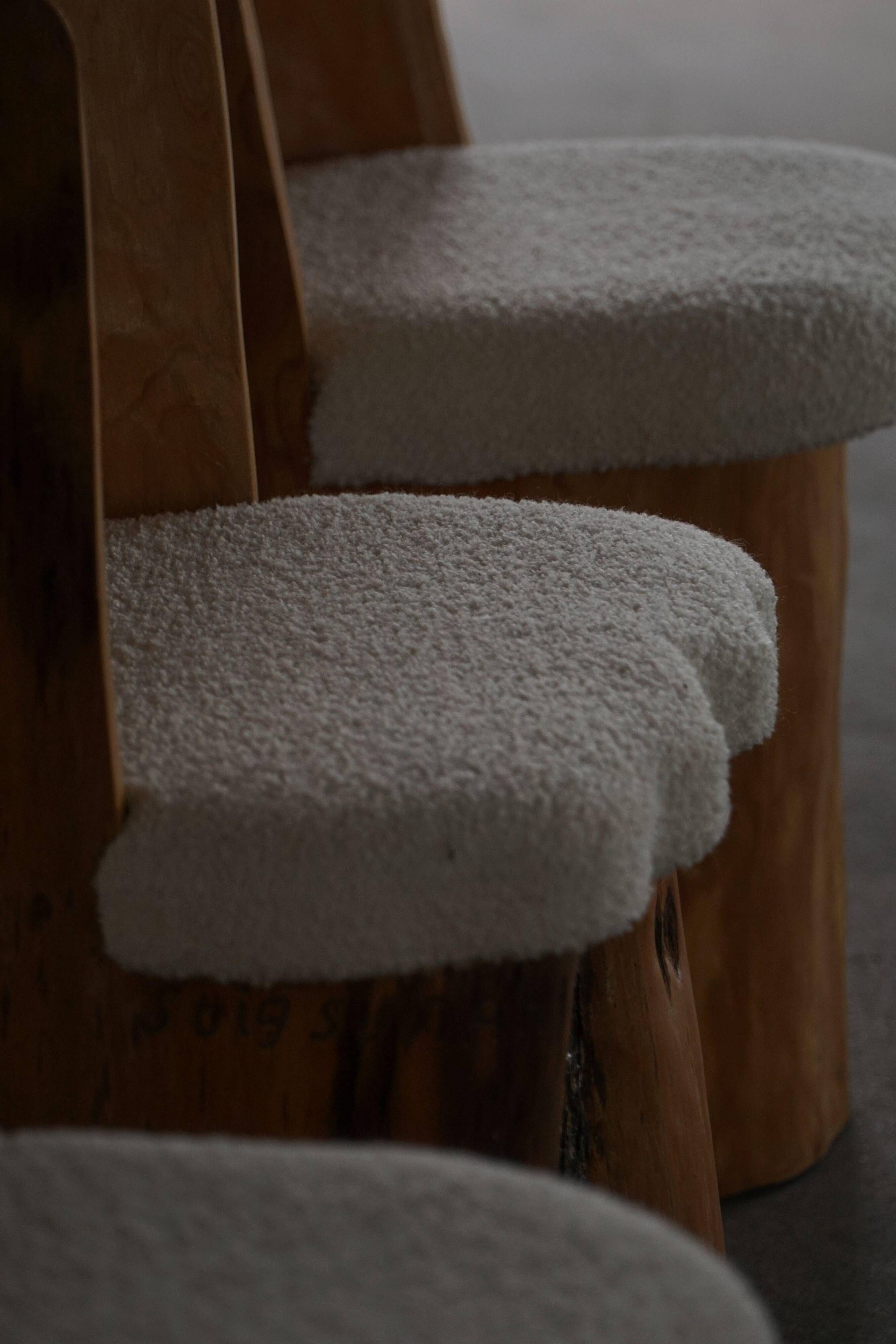 Swedish modernity, set of four stump chairs, solid Wood Wood with boucle seats, 1960s.