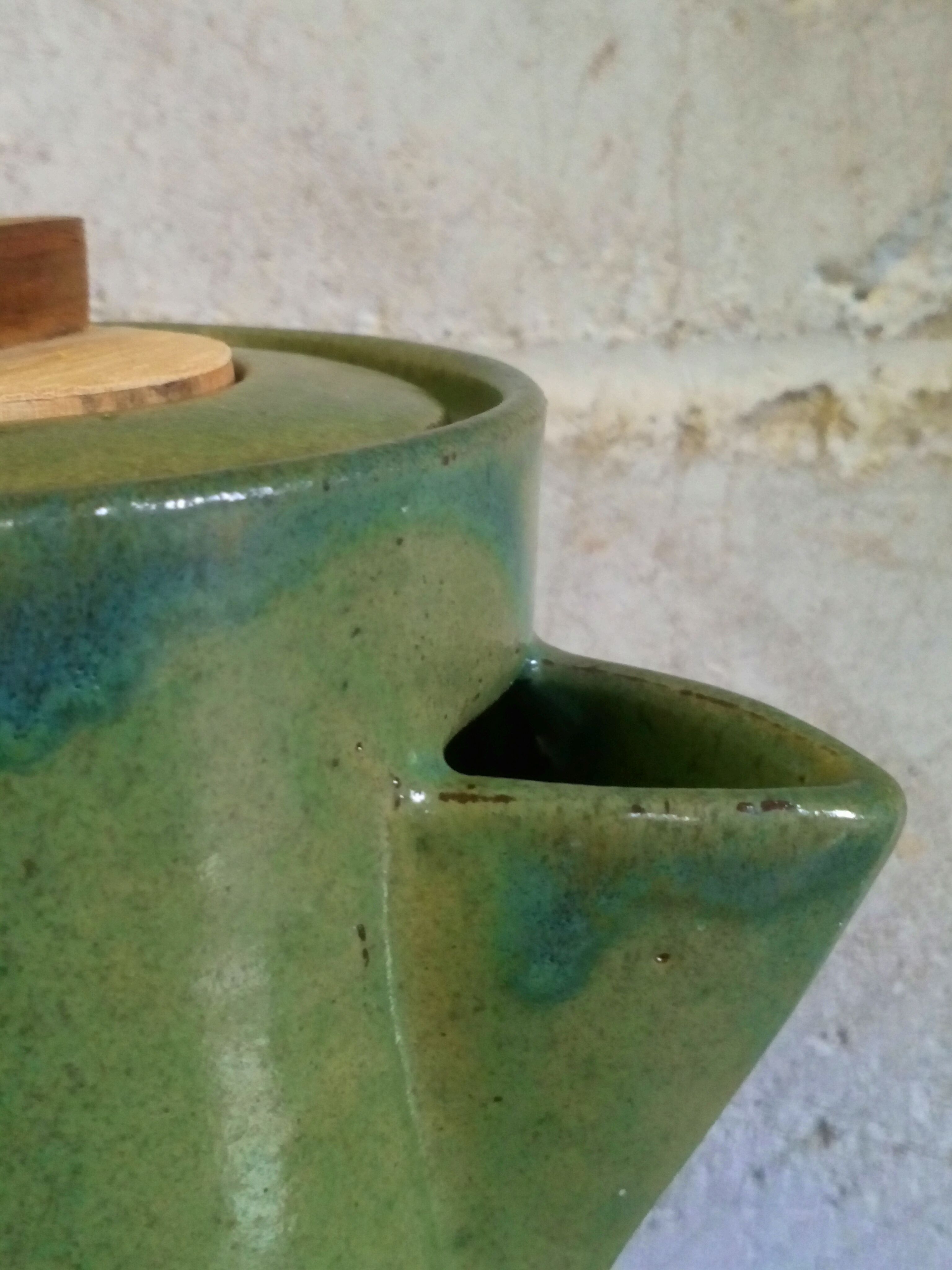 Green emailed sandstone teapot