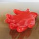 Empty hand-shaped pocket in red ceramic 80s