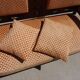 Old bench in wood and orange velvet