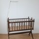 Old Vintage cradle with balance on wheels