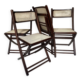 Set of four folding chairs in wood and cane.