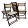 Set de quatre chaises pliantes en bois et cannage