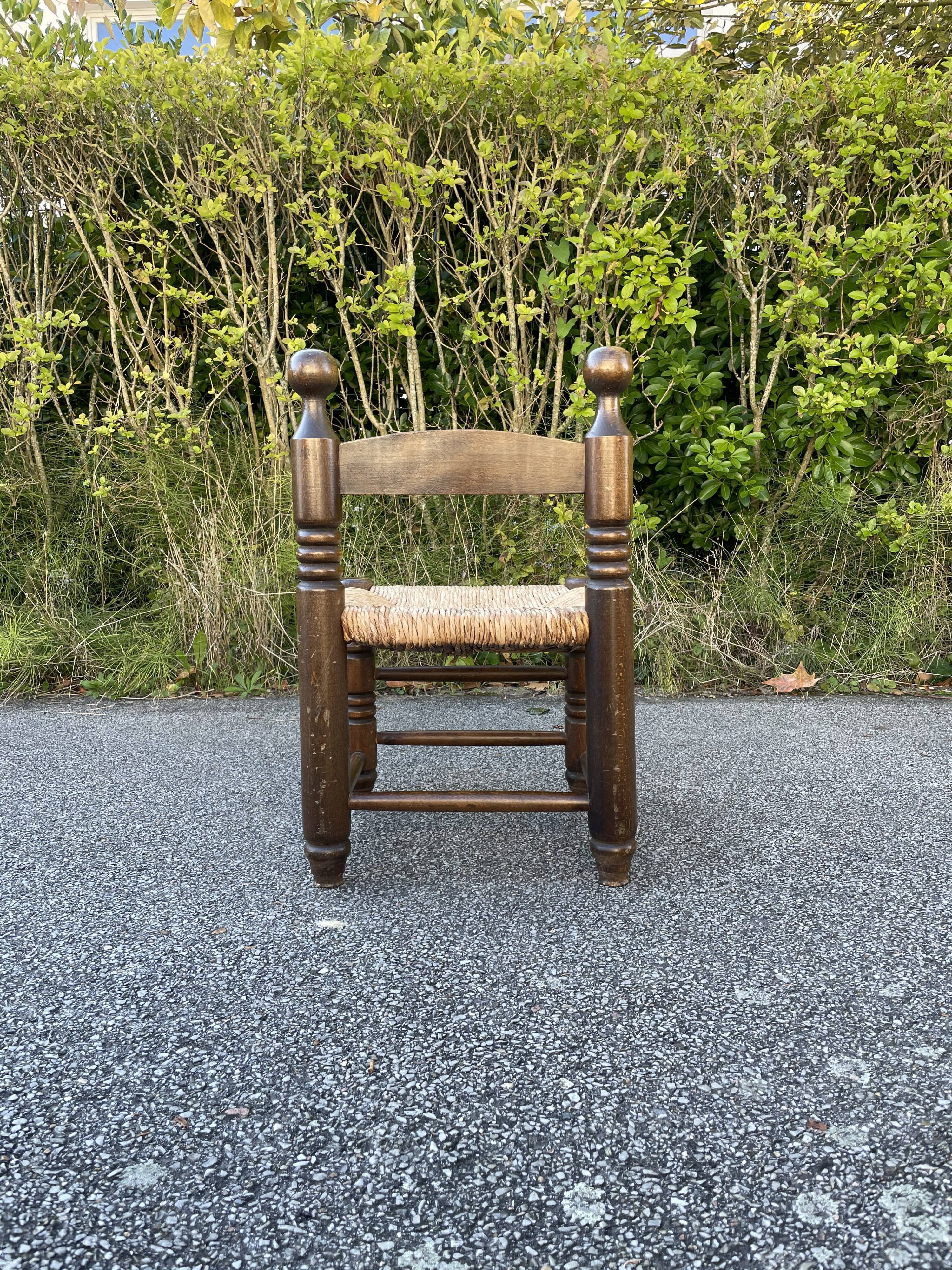 Small wooden and straw chair