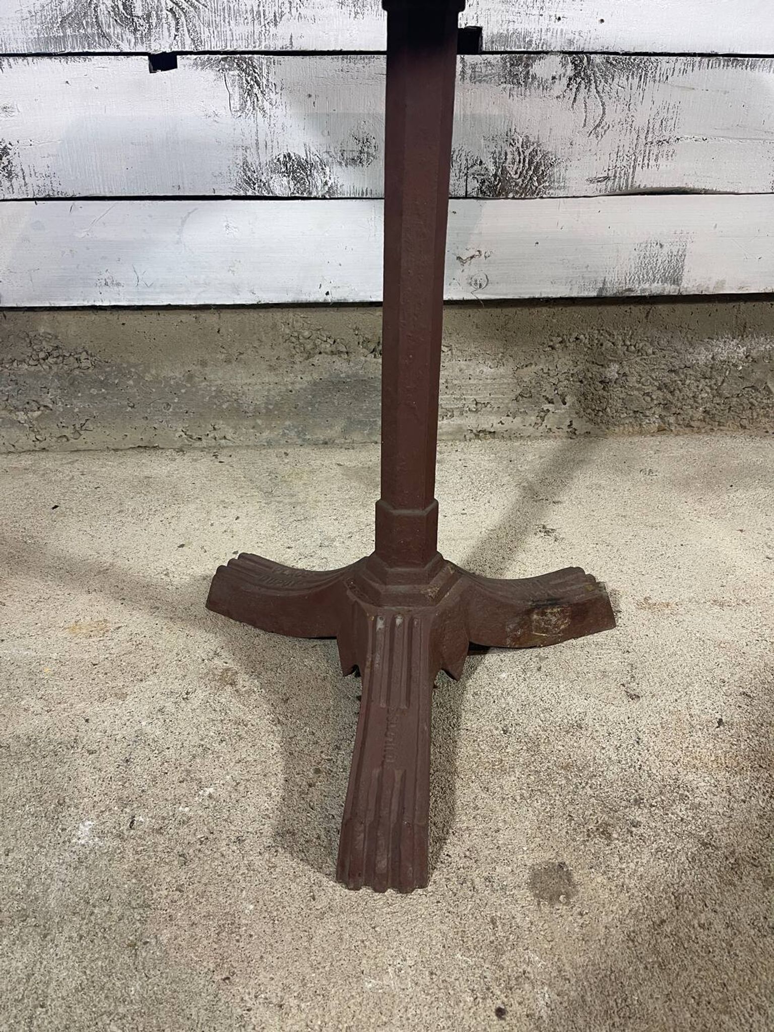 Bistro table with a cast iron base