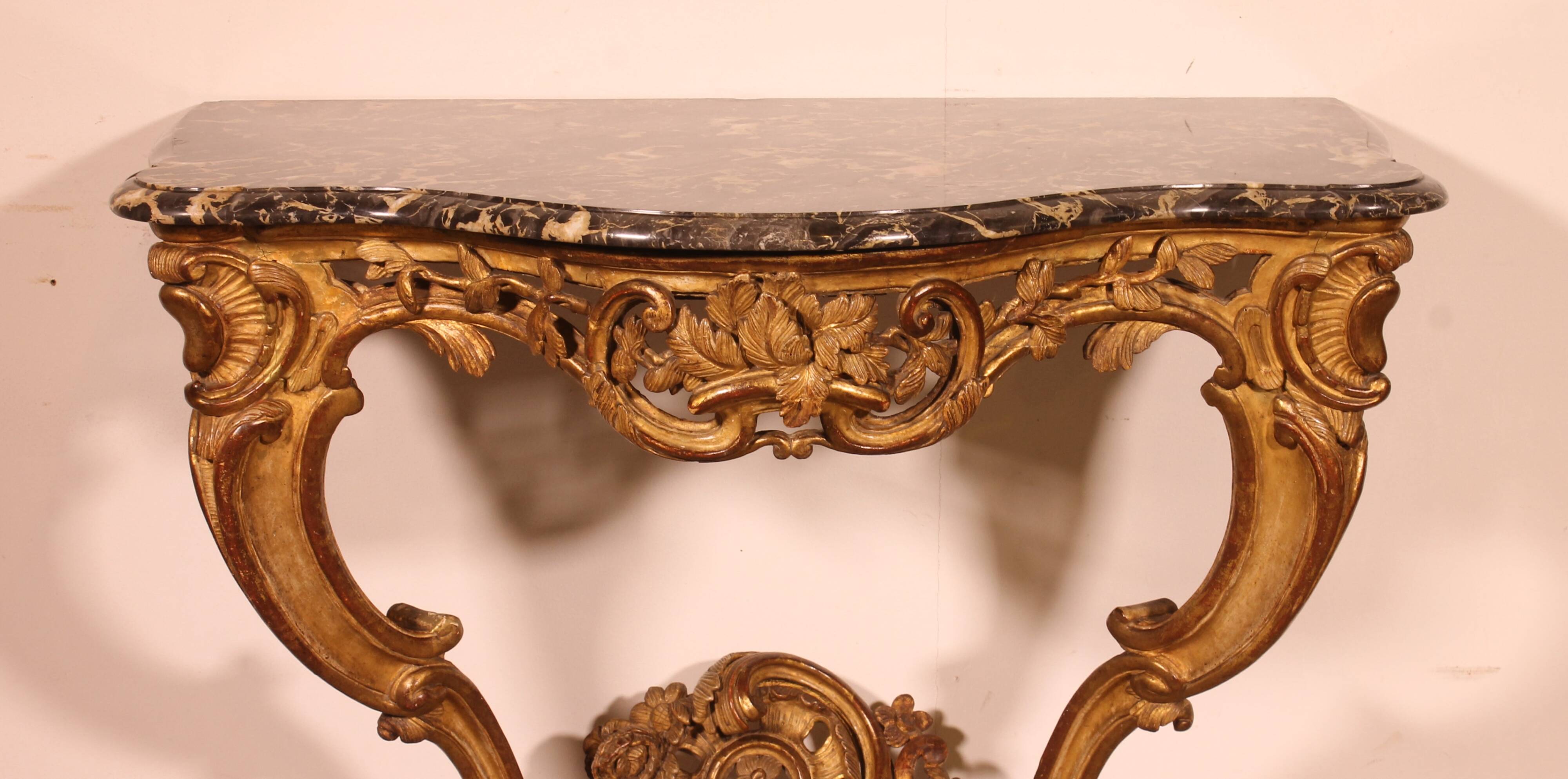 Louis XV period console in gilded wood
