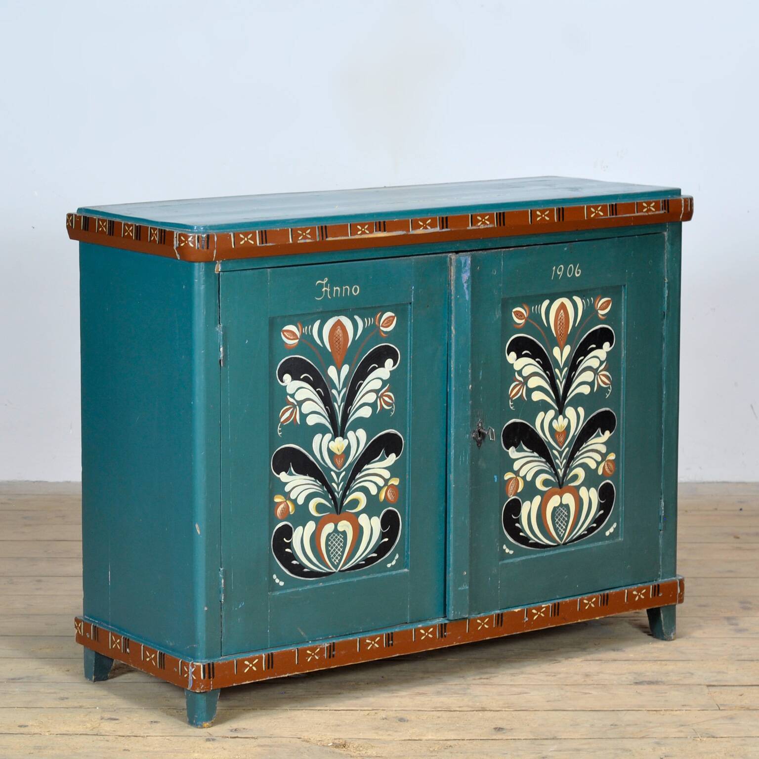 Original antique Swedish cabinet with blue-green folk style painting, dated 1906