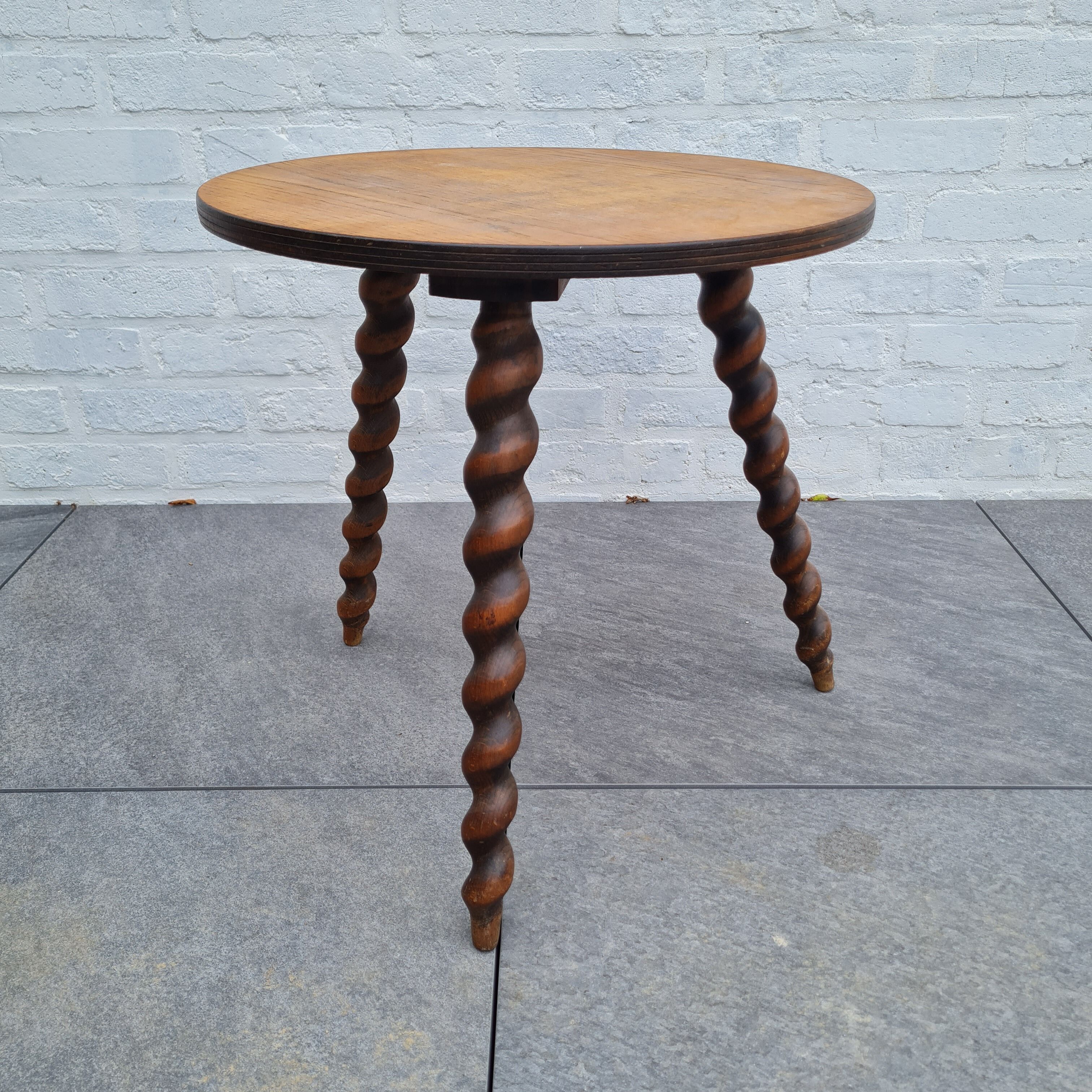 Wooden coffee table twisted tripod base