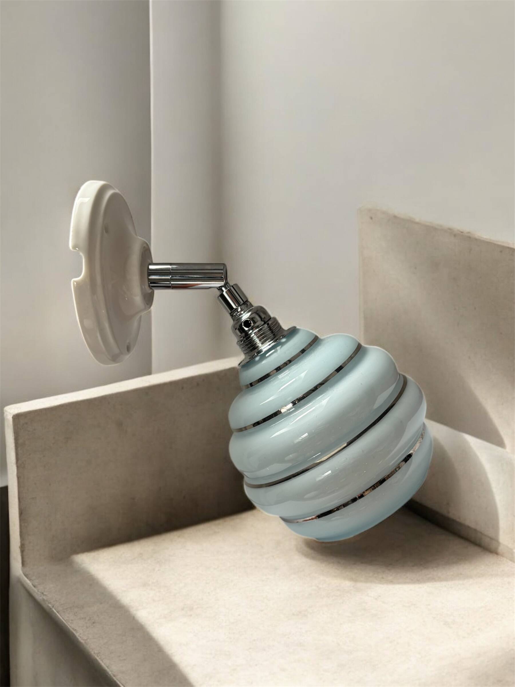 Blue and silver wall light