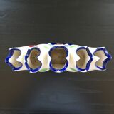 Fan vase with floral decoration