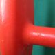 Pair of Patère coat rack Syla France plastic orange design 70s